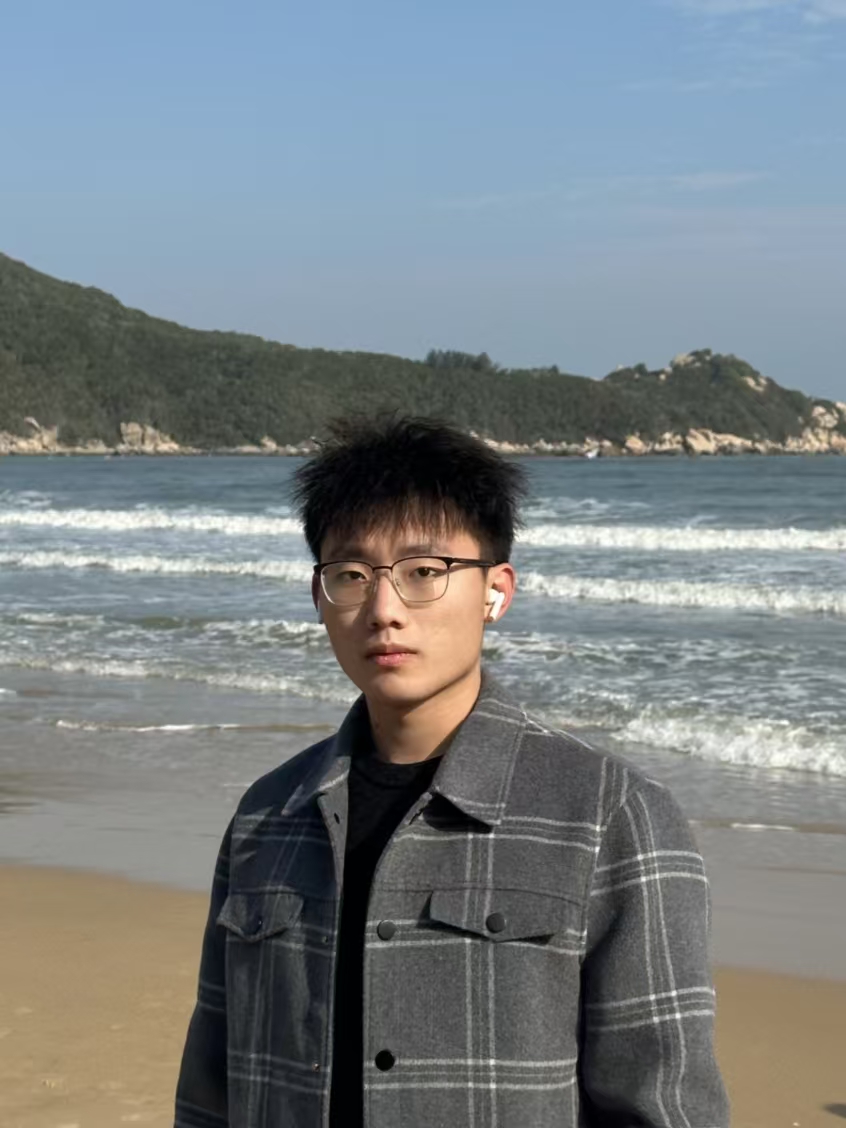 Enhao Huang by the sea